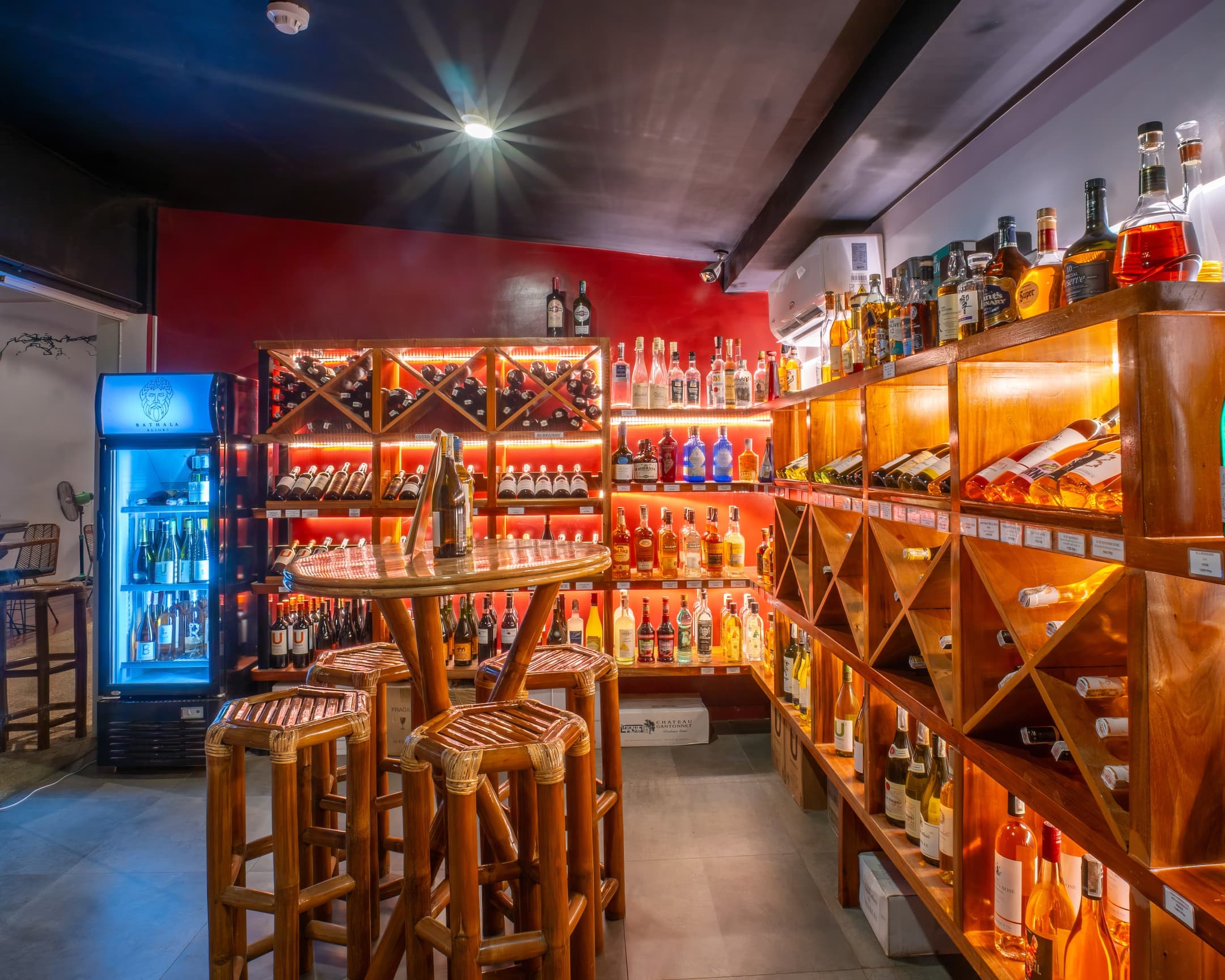 Wine cellar and drinks display at Bathala Resort