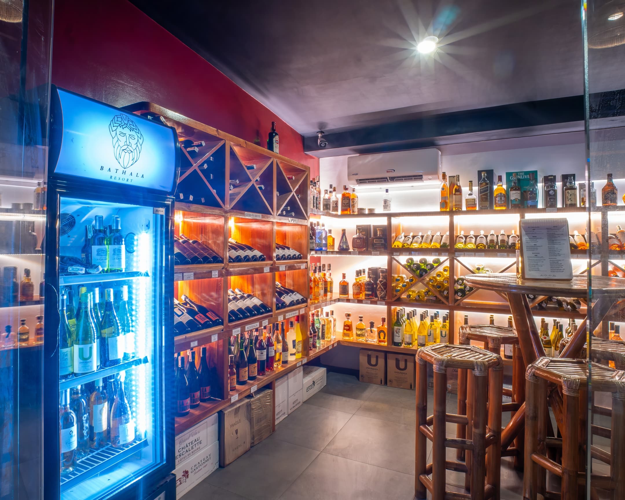 Drinks fridge and wine cellar shelves at Bathala Resort