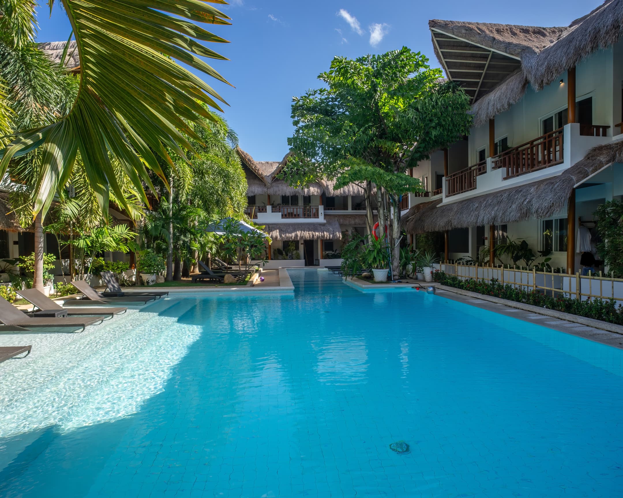 Sunny pool courtyard at Bathala Resort