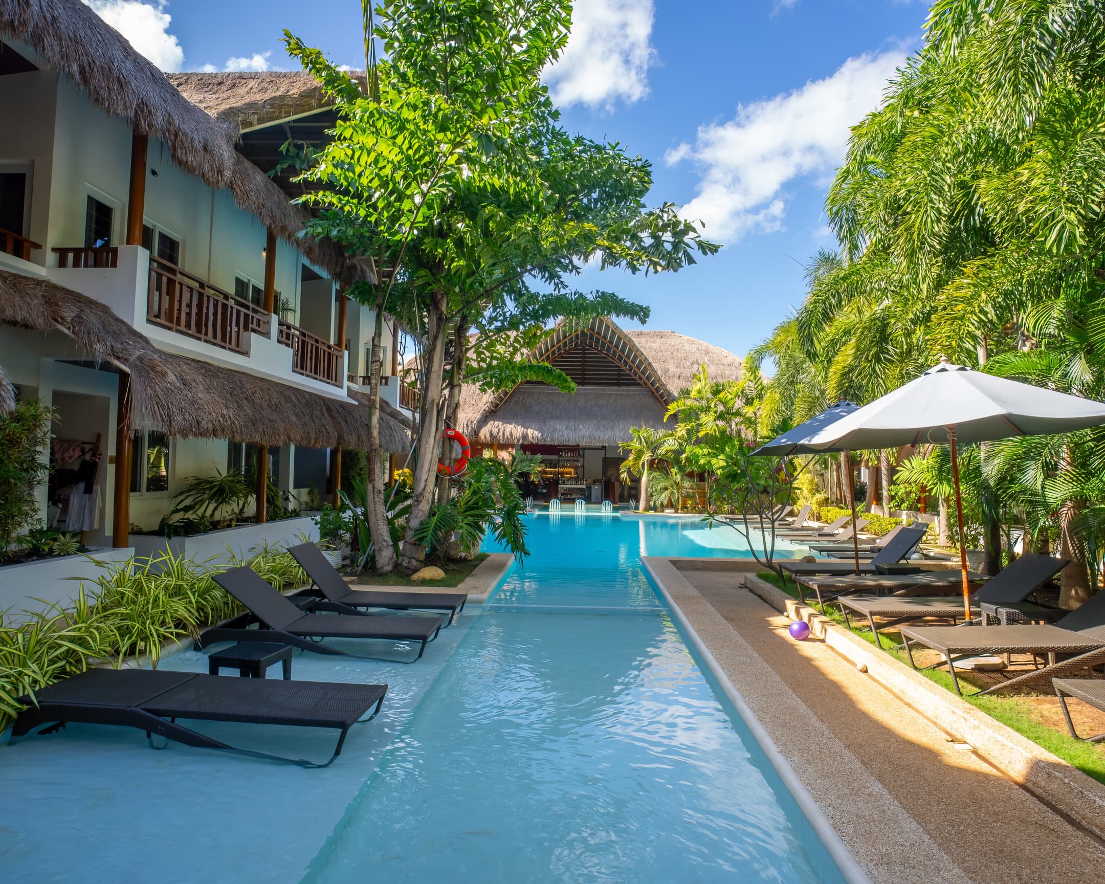 Long daytime pool view at Bathala Resort