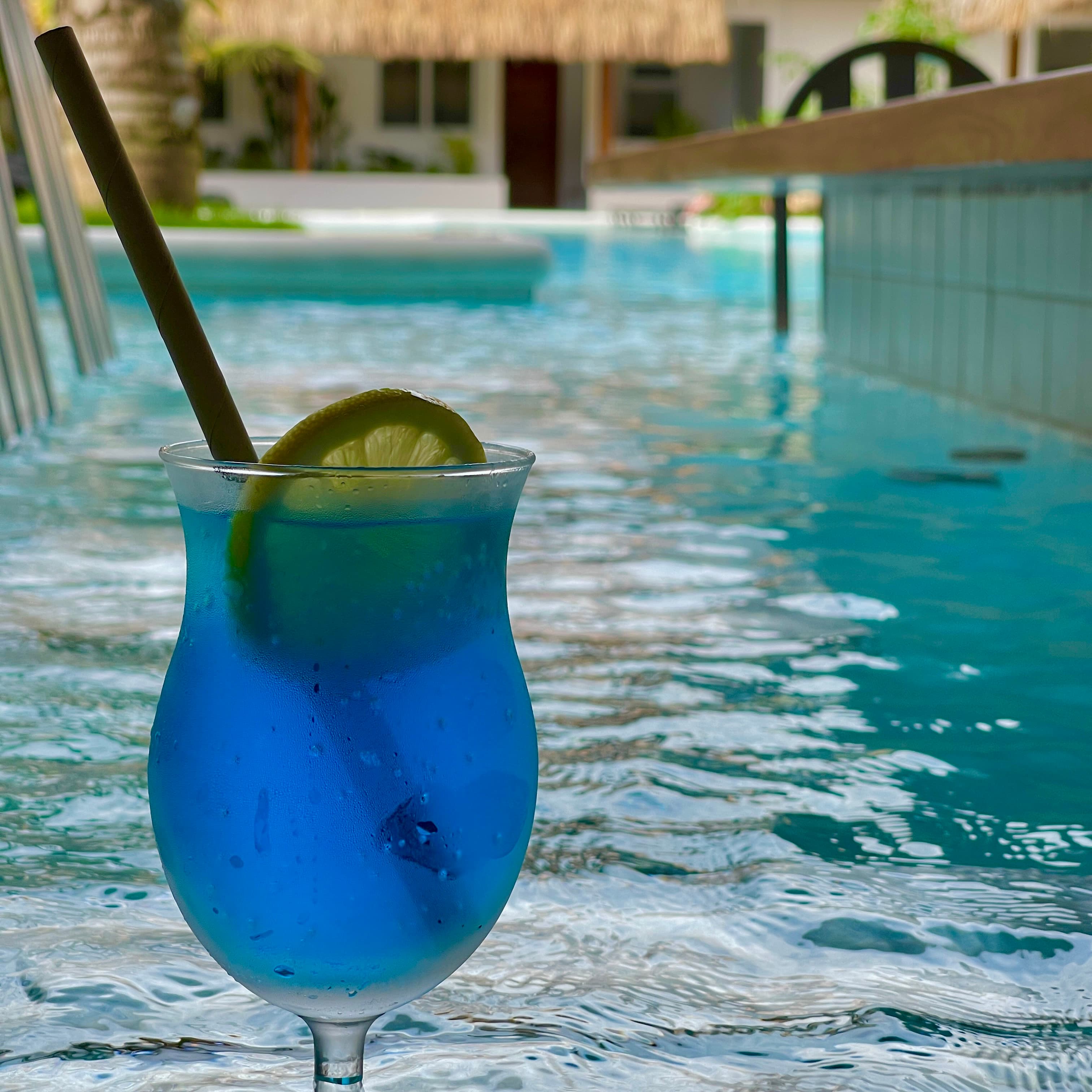 Cocktail by the pool at Bathala Resort